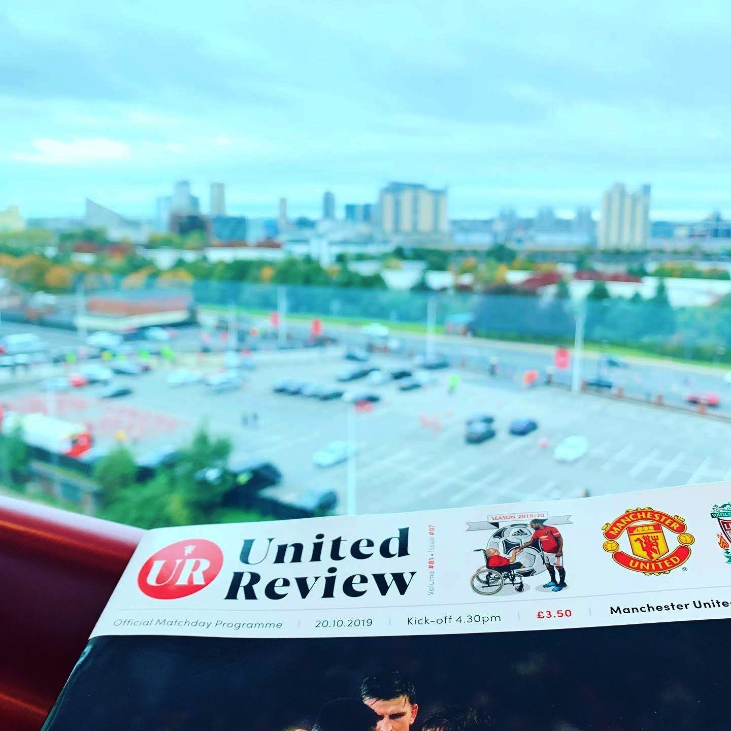 The view of downtown Manchester, out the window over a match program